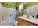 Bright bathroom with a tub and shower combination and a sink with vanity at 3553 Terneza Ave, North Las Vegas, NV 89081