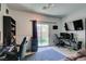 A carpeted bedroom featuring a sliding glass door leading to the backyard at 3553 Terneza Ave, North Las Vegas, NV 89081