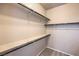 Walk-in closet with rod and shelf storage space at 406 Gracious Way, Henderson, NV 89011