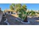 Backyard featuring desert landscaping and a view of the rear exterior at 4285 El Como Way, Las Vegas, NV 89121