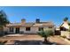 Backyard featuring desert landscaping and a view of the rear exterior at 4285 El Como Way, Las Vegas, NV 89121