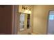 Vanity mirror with lighting above the double sinks at 4285 El Como Way, Las Vegas, NV 89121