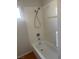 Bathroom with a shower/tub combo with white tile at 4285 El Como Way, Las Vegas, NV 89121