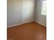 Bedroom featuring neutral paint, a window, and tiled floor at 4285 El Como Way, Las Vegas, NV 89121