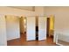 Bright bedroom view to bathroom showcasing tile flooring and an open layout at 4285 El Como Way, Las Vegas, NV 89121