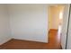 Bedroom with tile floor, blank walls, and open doorway to another room at 4285 El Como Way, Las Vegas, NV 89121