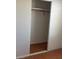 View of empty closet with sliding doors and rod for hanging clothes at 4285 El Como Way, Las Vegas, NV 89121