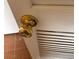 Close up of a gold colored door knob on a white door at 4285 El Como Way, Las Vegas, NV 89121