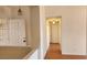 Bright entryway featuring a security door and stylish pendant lighting at 4285 El Como Way, Las Vegas, NV 89121