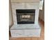 Marble tiled fireplace enhances the charm of the living space at 4285 El Como Way, Las Vegas, NV 89121
