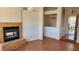 Spacious living room showcasing a fireplace, tile floors, neutral walls, and an open concept at 4285 El Como Way, Las Vegas, NV 89121