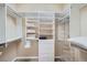 Walk-in closet with shelving and drawers for ample storage at 4552 Largo Cantata St, Las Vegas, NV 89135