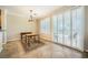 Bright dining area with plantation shutters and tile flooring, perfect for casual meals or formal gatherings at 4552 Largo Cantata St, Las Vegas, NV 89135