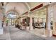Community gym with modern equipment, seating area, and lots of natural light at 4552 Largo Cantata St, Las Vegas, NV 89135