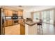 This spacious kitchen features stainless steel appliances, granite countertops, and ample cabinet space at 4552 Largo Cantata St, Las Vegas, NV 89135
