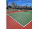 Newly constructed pickleball court with a vibrant green and red playing surface at 4552 Largo Cantata St, Las Vegas, NV 89135