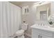 Clean bathroom with a shower-tub combo, a white vanity and modern finishes at 4745 Madrigal Way, Las Vegas, NV 89122