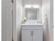 Updated bathroom with a white vanity, quartz counters, and modern fixtures at 4745 Madrigal Way, Las Vegas, NV 89122