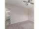 Bedroom with ensuite bathroom featuring carpet and neutral paint at 4745 Madrigal Way, Las Vegas, NV 89122