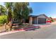 Charming single-story home with gray paint, rock details, and two-car garage at 4745 Madrigal Way, Las Vegas, NV 89122
