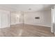 Open living area featuring modern flooring, neutral walls, and ample natural light at 4745 Madrigal Way, Las Vegas, NV 89122