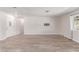 Bright and spacious living room with sleek flooring and neutral-toned walls at 4745 Madrigal Way, Las Vegas, NV 89122