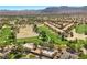 Overhead view showcasing the golf course, lush landscaping, and mountain views at 4821 Black Bear Rd # 101, Las Vegas, NV 89149