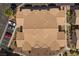 Aerial shot of condo roofs, visitor parking, and well-kept landscaping at 4821 Black Bear Rd # 101, Las Vegas, NV 89149