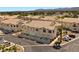 Townhome exteriors with private garages, ample parking, and well-manicured landscaping at 4821 Black Bear Rd # 101, Las Vegas, NV 89149