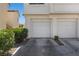 Attached garages of the Painted Desert condos with well maintained landscaping at 4821 Black Bear Rd # 101, Las Vegas, NV 89149