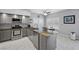 Kitchen features granite countertops, stainless steel appliances, and bright lighting at 4821 Black Bear Rd # 101, Las Vegas, NV 89149