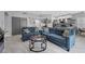 Inviting living room featuring stylish furnishings, an open layout, and seamless flow into the kitchen at 4821 Black Bear Rd # 101, Las Vegas, NV 89149