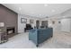 Cozy living room featuring a fireplace, neutral tones, and tiled floors in this Painted Desert condo at 4821 Black Bear Rd # 101, Las Vegas, NV 89149