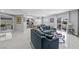 Open-concept living space with kitchen view and balcony at 4821 Black Bear Rd # 101, Las Vegas, NV 89149