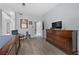 Spacious main bedroom showcasing a dresser, ceiling fan, and hardwood floors at 4821 Black Bear Rd # 101, Las Vegas, NV 89149