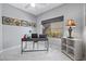 Office with desk and shelving, offers natural light and workspace at 4821 Black Bear Rd # 101, Las Vegas, NV 89149