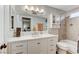 Well lit bathroom featuring a modern vanity, tile backsplash, and updated fixtures at 4835 Illustrious St, Las Vegas, NV 89147