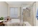 Bathroom features a luxurious soaking tub and a tiled shower with a glass enclosure at 4835 Illustrious St, Las Vegas, NV 89147