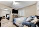 Bedroom featuring mirrored closet doors and a dresser for storage and display at 4835 Illustrious St, Las Vegas, NV 89147