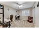 Well-lit bedroom with shutters and ample space for a desk or seating area at 4835 Illustrious St, Las Vegas, NV 89147