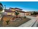 Charming two-story home showcasing desert landscaping and a three-car garage, ideal for Gathering living at 4835 Illustrious St, Las Vegas, NV 89147
