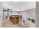 Upstairs hallway boasting lots of natural light, built in cabinets, and views of the staircase at 4835 Illustrious St, Las Vegas, NV 89147