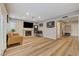 Spacious living room features fireplace, TV, and recessed lighting at 4835 Illustrious St, Las Vegas, NV 89147