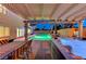Inviting patio area with hot tub, dining table, and pool views, great for outdoor gatherings at 4835 Illustrious St, Las Vegas, NV 89147