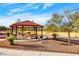 Covered picnic tables in a common area provide an outdoor venue for residents to enjoy at 4835 Illustrious St, Las Vegas, NV 89147