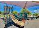 Shaded playground featuring slides and climbing elements, ensuring enjoyable playtime at 4835 Illustrious St, Las Vegas, NV 89147