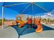 Bright playground with slides and climbing areas, offering a fun and engaging outdoor space at 4835 Illustrious St, Las Vegas, NV 89147