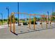 Bright playground with swings and play structures, ideal for outdoor adventures at 4835 Illustrious St, Las Vegas, NV 89147