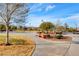 Park walking paths feature benches, mature trees, and lush landscaping for outdoor enjoyment at 4835 Illustrious St, Las Vegas, NV 89147