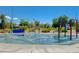 Vibrant water park featuring colorful play structures and refreshing fountains for summer fun at 4835 Illustrious St, Las Vegas, NV 89147